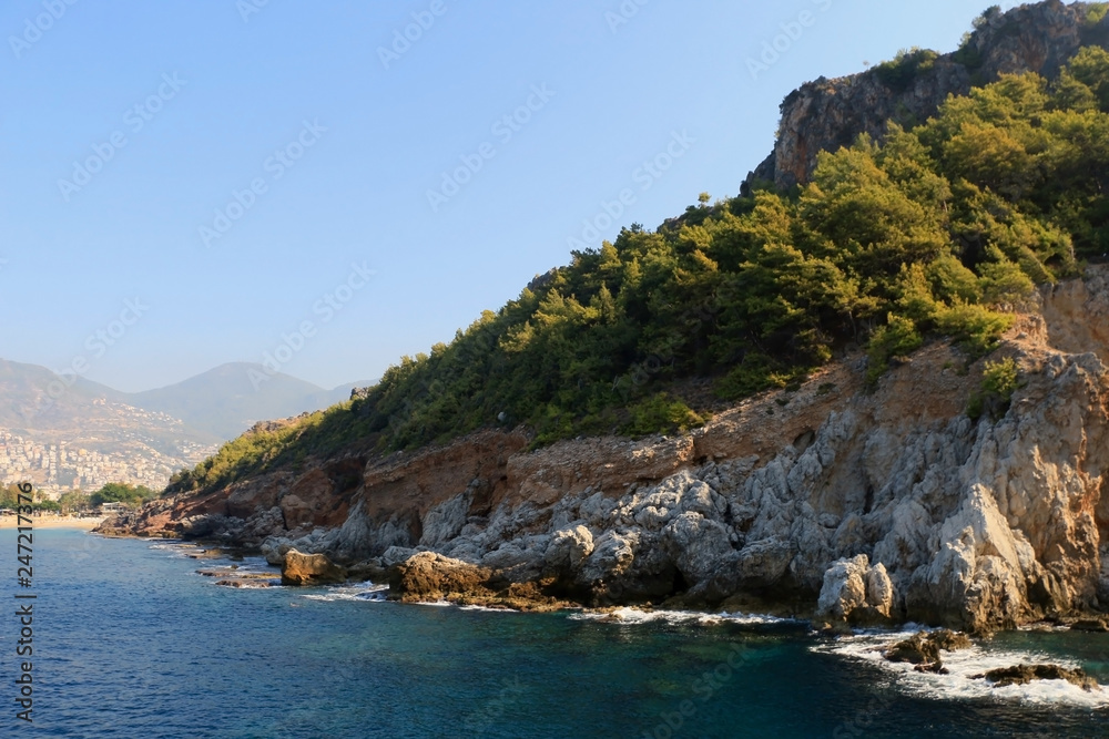 Rocky sea coast with the wave.