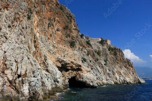 Rocky sea coast with the wave.