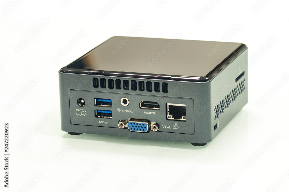 Single-board personal miniature computer with all digital ports showing functionality isolated on white. Single-board personal miniature computer with all digital ports showing functionality isolated on white.
