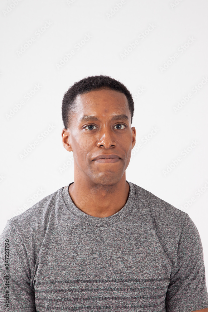Black man in a grey shirt Black man in a grey shirt
