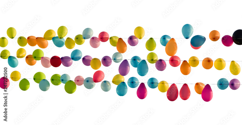 Multicolored balloons on outstretched ropes. Isolated on white background.