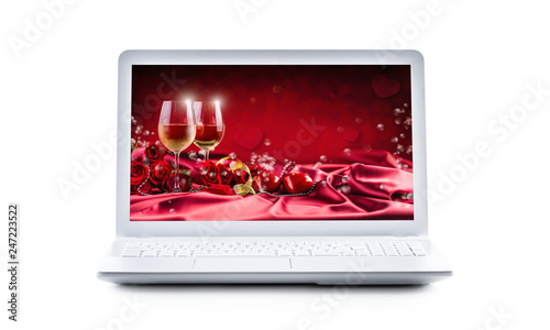 Fototapeta Naklejka Na Ścianę i Meble -  Valentine or wedding image in a screen of a laptop isolated on white background