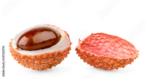 Half ripe lychee on a white, isolated.