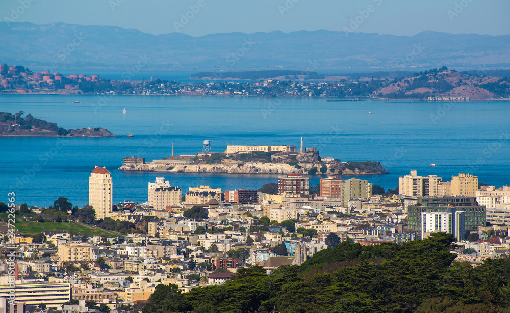 Aerial view of Alcatraz island with Angel Island in the background.