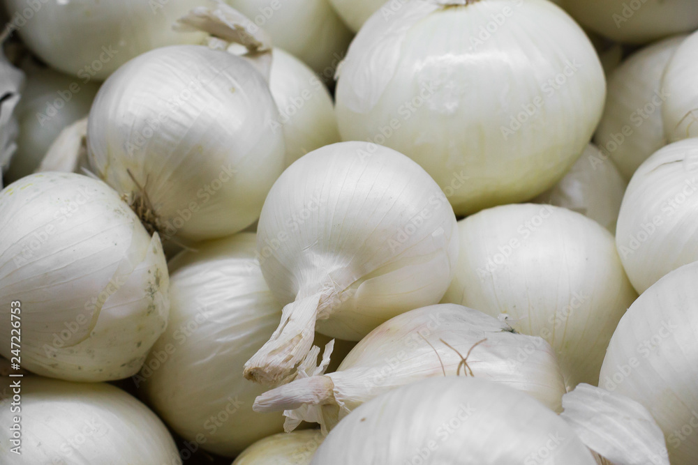Onions at the open market close up background