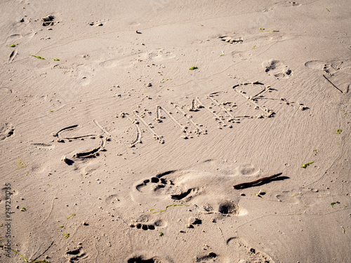 sign summer on the sand 