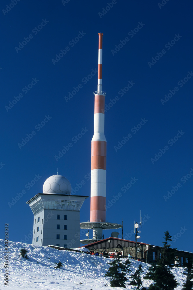 Radio transmission tower and snow-covered trees on Mt Brocken, Harz, Saxony-Anhalt, Germany, Europe Radio transmission tower and snow-covered trees on Mt Brocken, Harz, Saxony-Anhalt, Germany, Europe