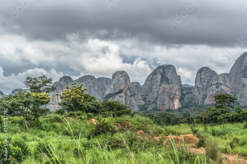 View of a tropical landscape, with forest and mountains Pungo Andongo, Pedras Negras , black stones, huge geologic rock elements, Angola photo