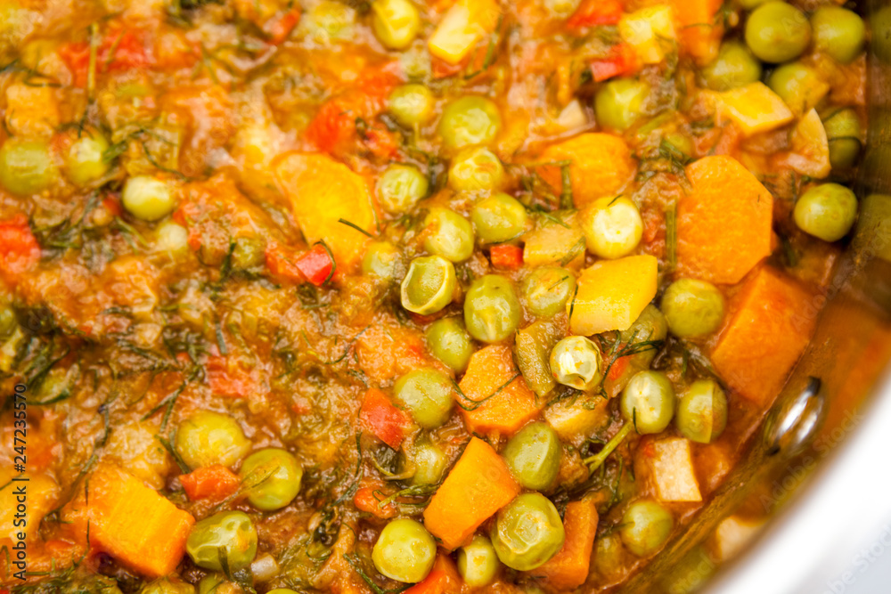 Stew with peas, carrots, onions, tomato sauce and spices Stew with peas, carrots, onions, tomato sauce and spices