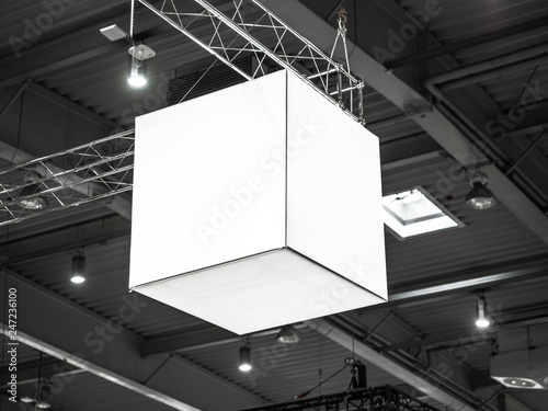 Mock up. Indoor advertising at the fair, event, Public information board hanging of empty white mock up signage. Cubic, squared, box 360 degrees.