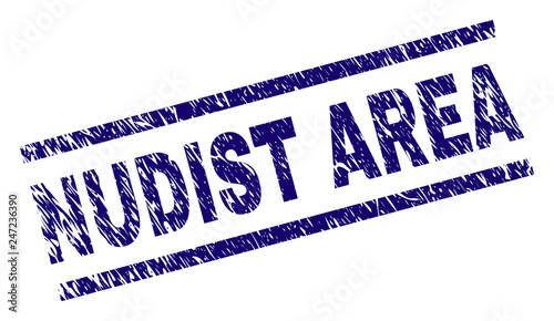 NUDIST AREA seal print with distress style. Blue vector rubber print of NUDIST AREA tag with unclean texture. Text caption is placed between parallel lines.