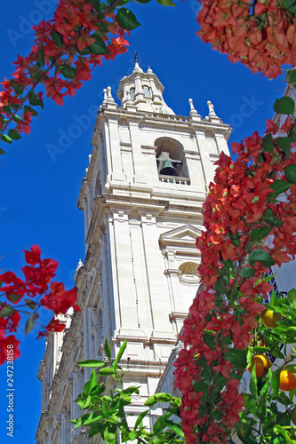 Lisbon, Portugal, 10/28/2017. Snow-white baroque bell-towers of mannerist church in Monastery of Sao Vicente of Fora, royal pantheon of the Braganza monarchs of Portugal, in a sunny October day