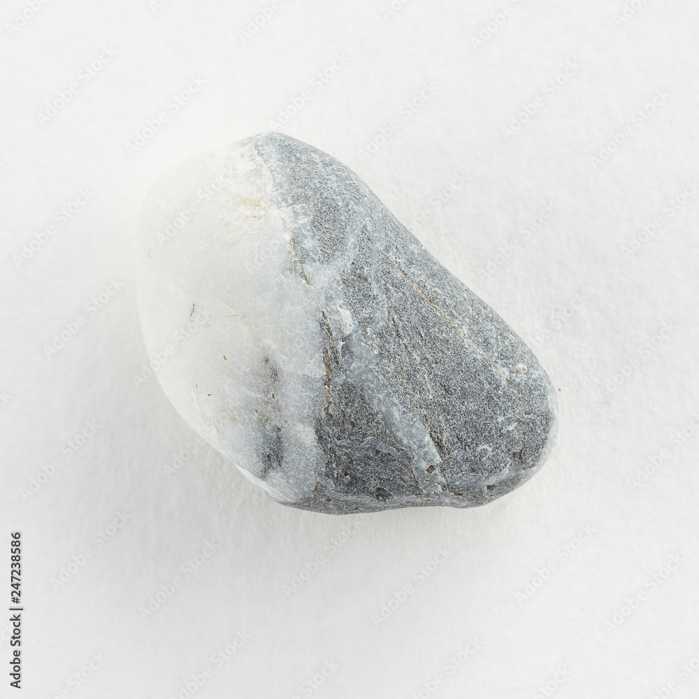 Sea pebble on a white background Sea pebble on a white background