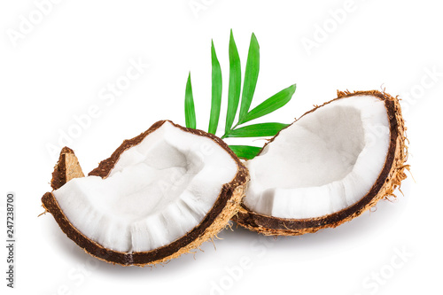 piece of coconut with leaves isolated on white background