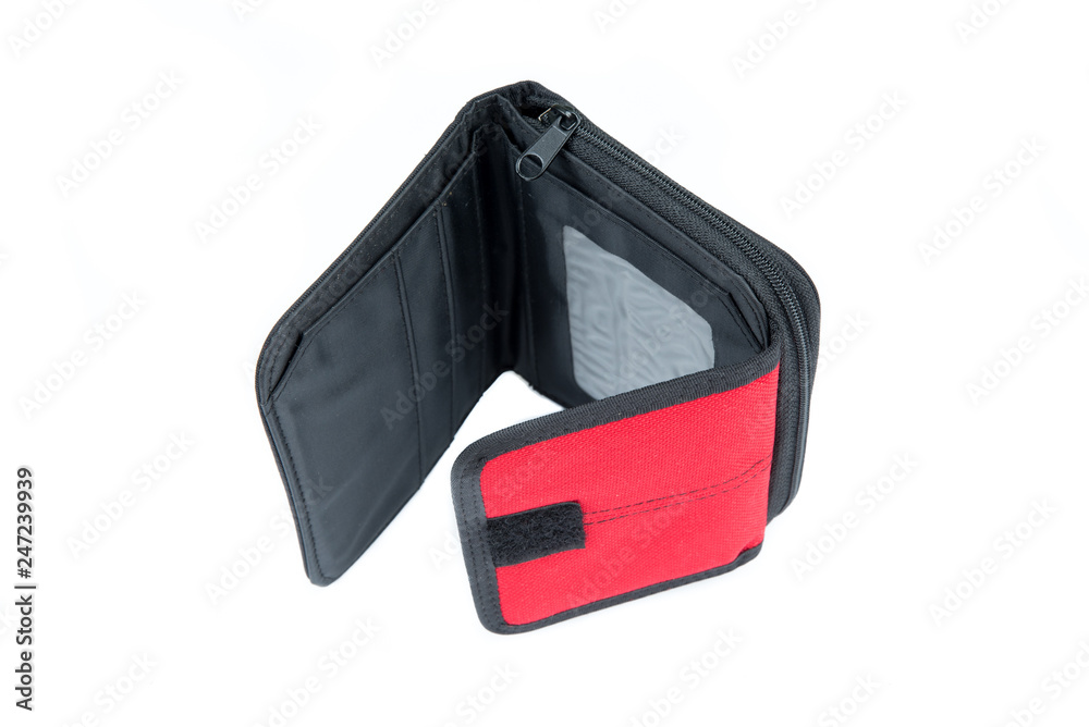 Open wallet in red and black on a white background. Empty purse with no money. Minimalism design. Wallet for shopping. No pocket money. Top view. Open wallet in red and black on a white background. Empty purse with no money. Minimalism design. Wallet for shopping. No pocket money. Top view.