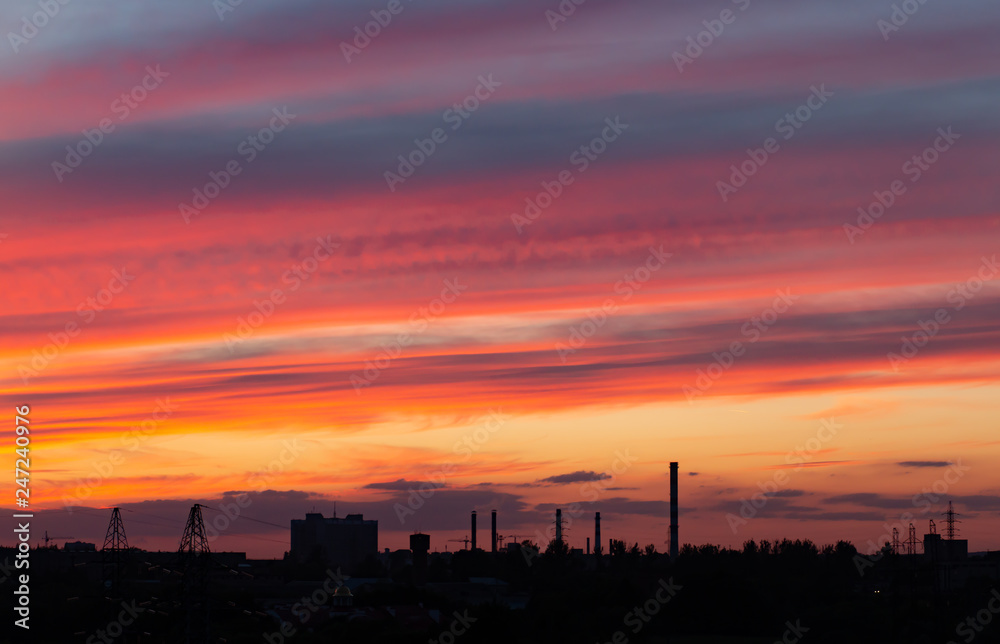 red sky at sunset. beautiful overflows of colors at sunset, urban landscape