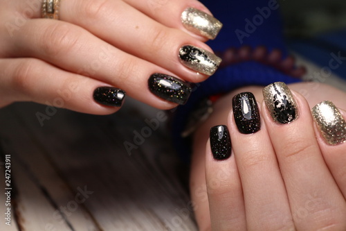 Stylish manicure nails on a beautiful textural background