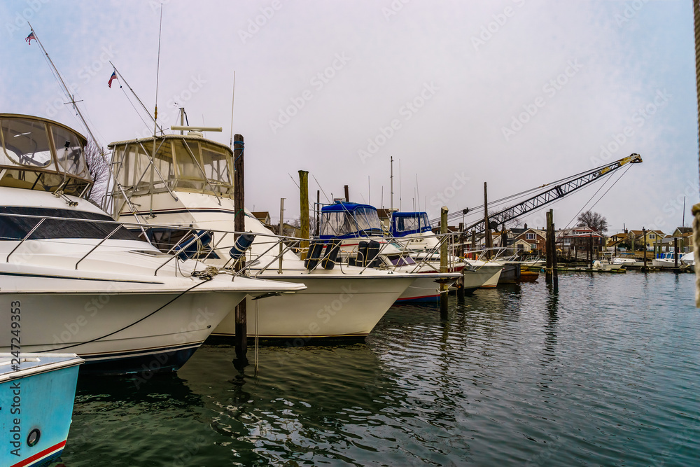 Fototapeta premium Fishing boats on pier of Jamaica Bay, Brooklyn