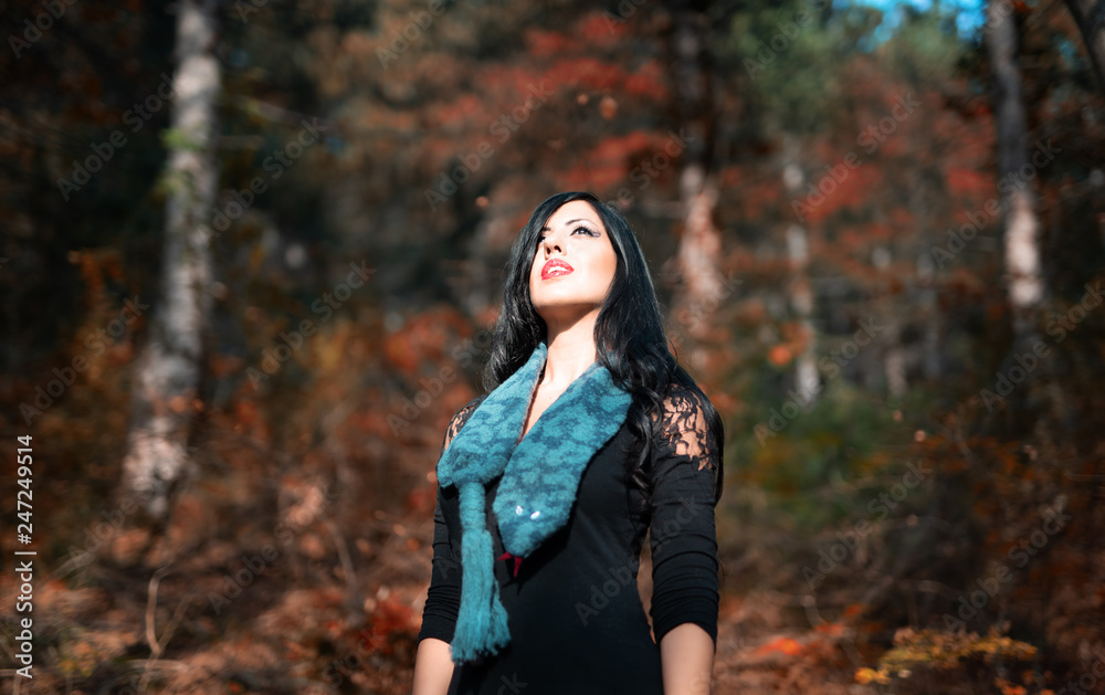 Fashion Portrait of young woman in a forest Fashion Portrait of young woman in a forest