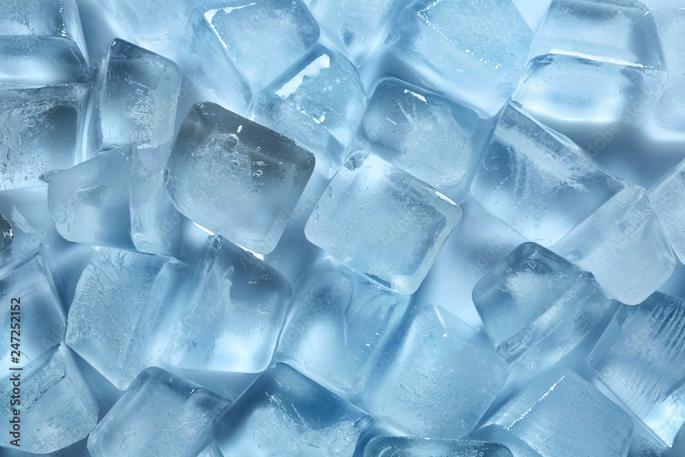 Many ice cubes on color background, top view