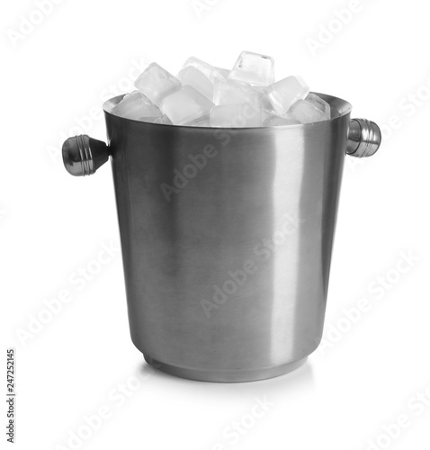 Metal bucket with ice cubes on white background