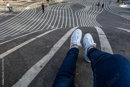 Canvas Print Legs on stripes on the ground in Superkilen, Copenhagen