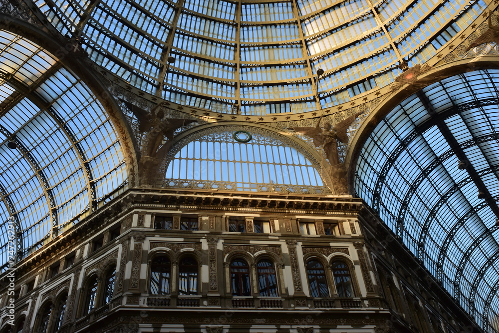 Building and gigantic glass ceiling with cupola of Galleria Umberto in Naples.