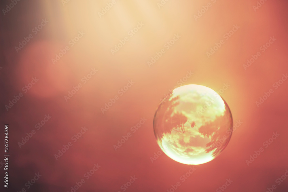 Natural heaven background, soap bubbles on background of sky, toned image, selective focus Natural heaven background, soap bubbles on background of sky, toned image, selective focus