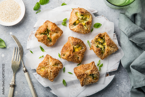 puff pastry stuffed with eggs and spinach photo