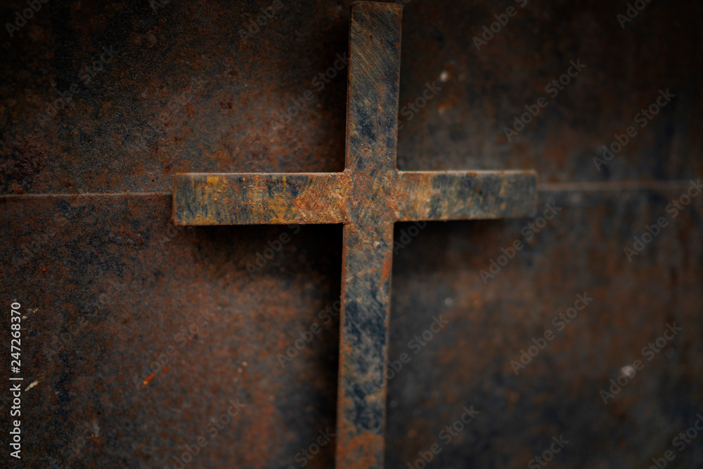 rusty cross - old and rusty cross iron door  rusty grunge background