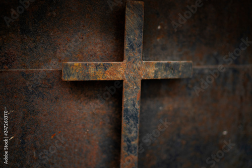rusty cross - old and rusty cross iron door rusty grunge background