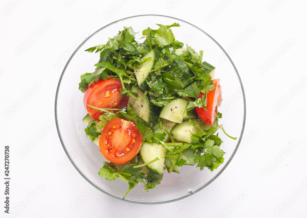 salad in transparency glass bowl isolated on white background salad in transparency glass bowl isolated on white background