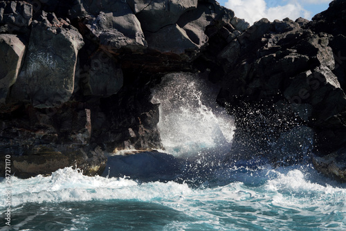 waves crashing on rocks on Big Island