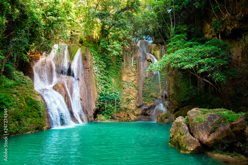 Dimiao Twin waterfalls in a mountain gorge in the tropical jungle of the Philippines, Bohol.