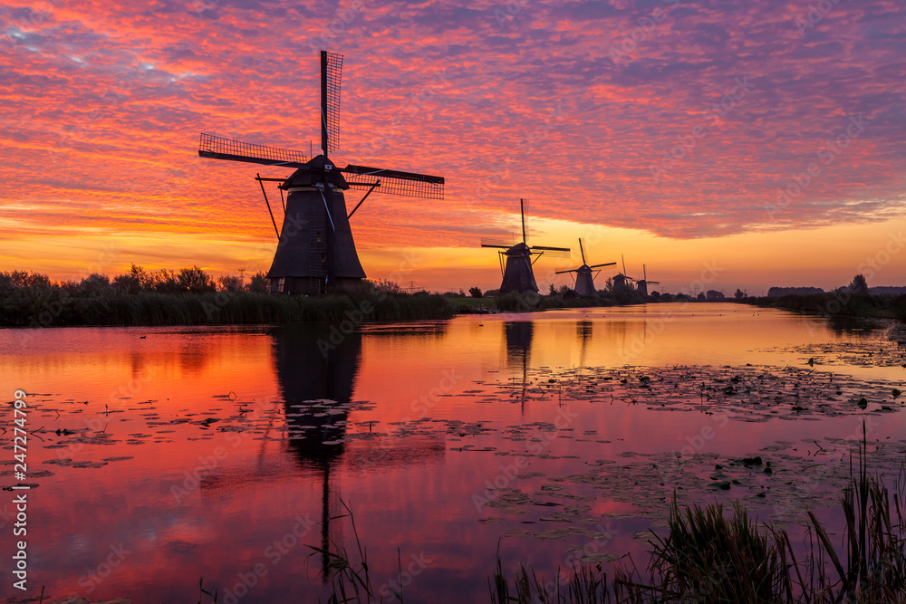 Kinderdijk in holland by sunrise