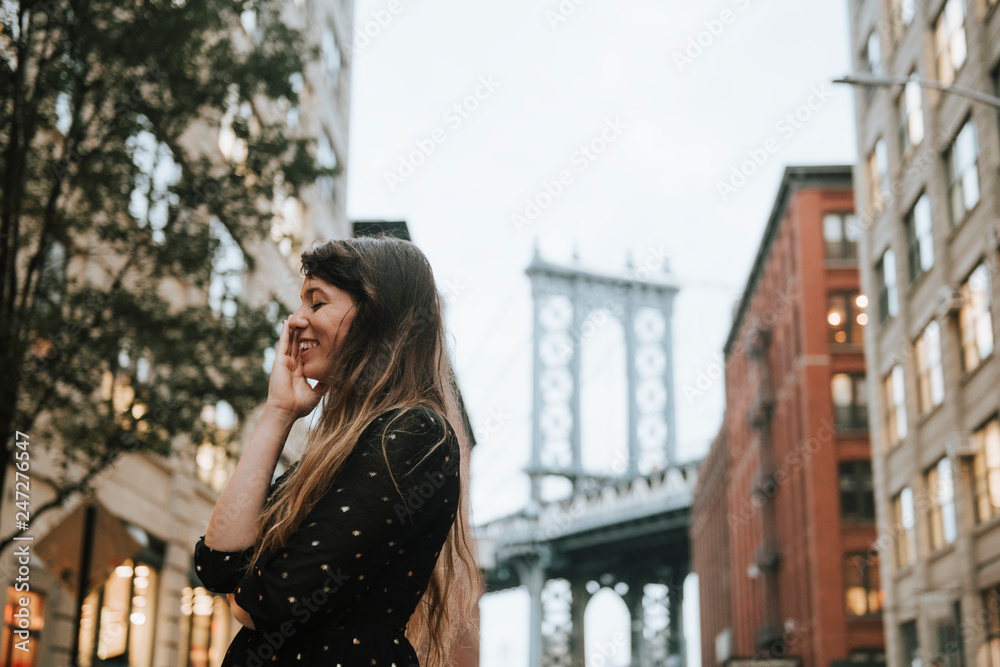 Shy woman in downtown Manhattan, USA