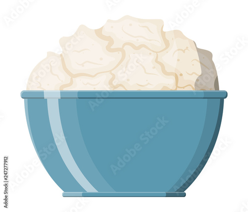 Cottage cheese in bowl isolated on white.