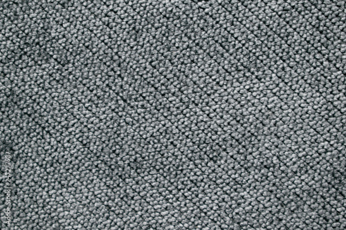 Dark gray unprinted suiting fabric from above .Cloth texture