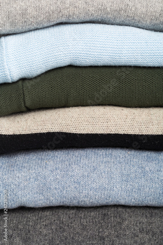 Winter and fall cozy sweaters stack, woolen sweaters