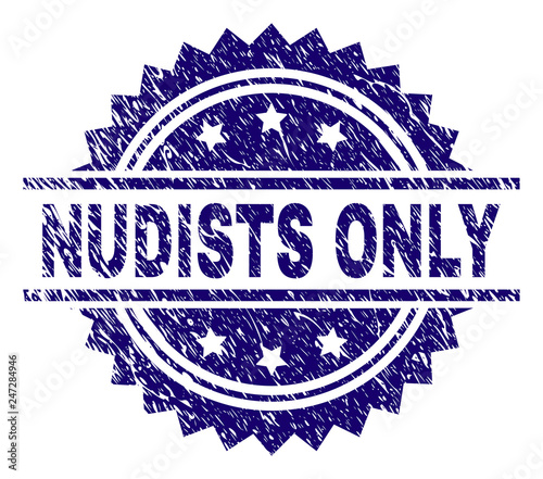 NUDISTS ONLY stamp seal watermark with distress style. Blue vector rubber print of NUDISTS ONLY caption with corroded texture.
