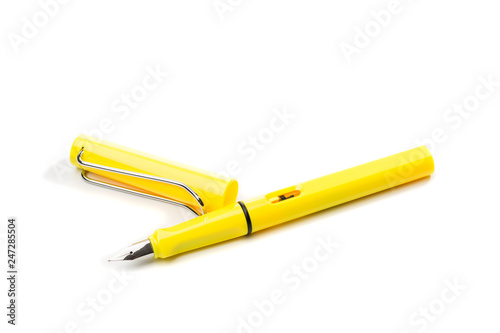 yellow modern fountain pen isolated on white, close up