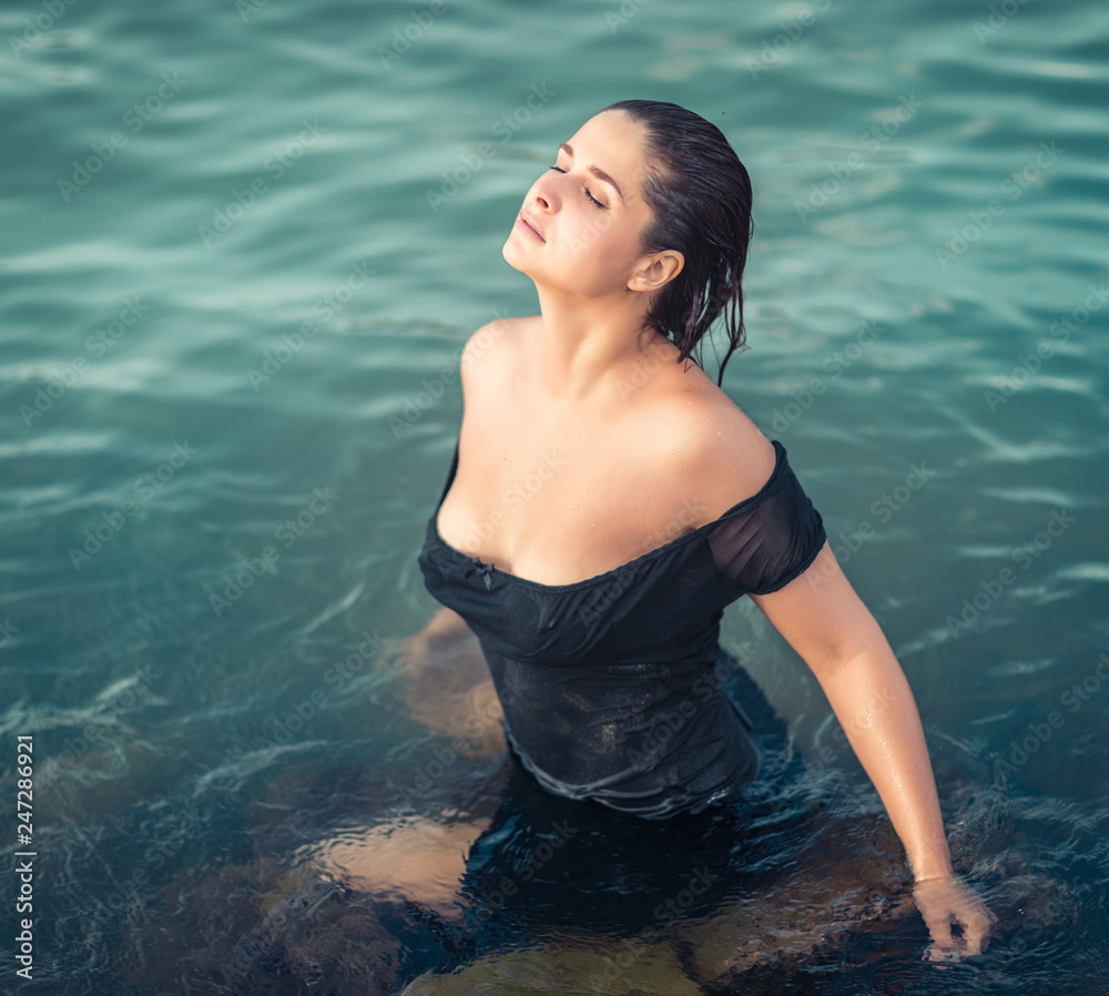 Fototapeta premium Portrait of a beautiful sexy woman outdoor