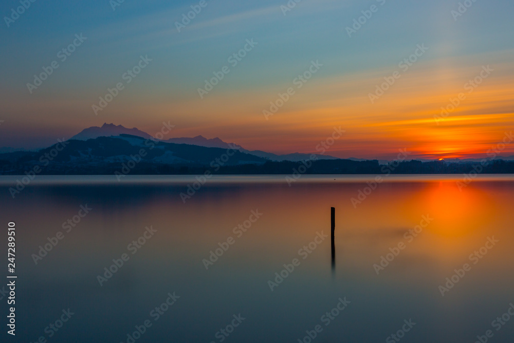 mount Pilatus and lake Zug at sunset,  blue sky
