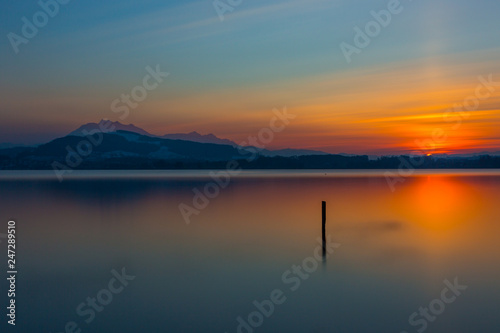 mount Pilatus and lake Zug at sunset, blue sky