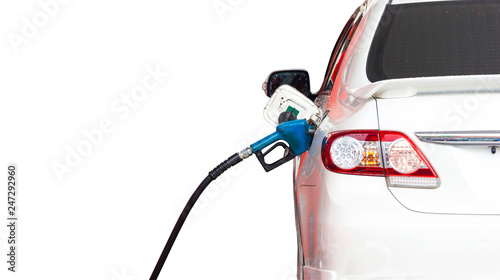Fototapeta Naklejka Na Ścianę i Meble -  Gasoline dispenser nozzle fuel fill oil into car tank isolated copy space