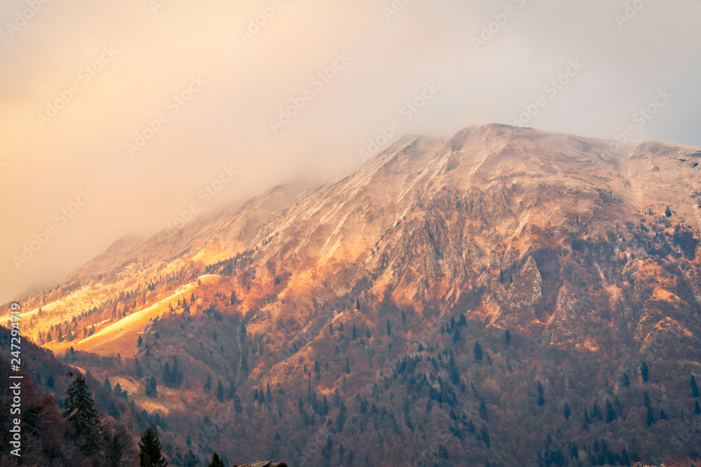 awesome view of the Orobie Alps at sunset, north Alps autumn / winter, the mountain is a little snow-covered ,Oltre il Colle,Seriana Valley,Bergamo Italy.