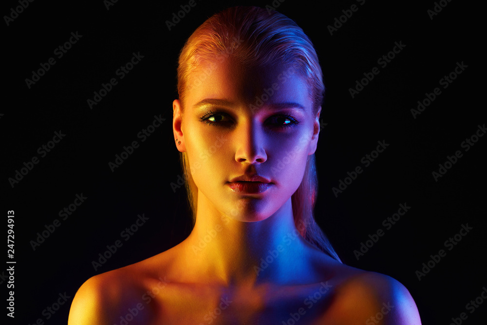 Rainbow woman. Beautiful Girl in color lights Rainbow woman. Beautiful Girl in color lights