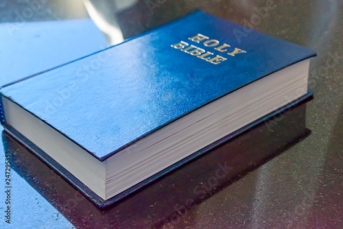 Holy Bible lies on the table.