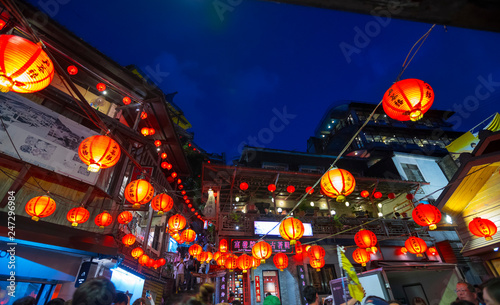 Beautiful Old Town Jiufen with crowd of tourists sightseeing at nighttime in New Taipei City, Taiwan photo