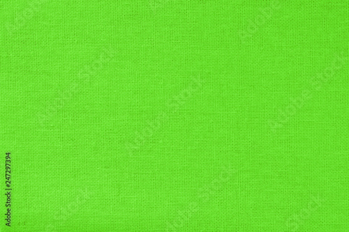 Green cotton fabric texture background, seamless pattern of natural textile.